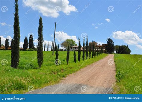 Tuscany Farmhouse In Morning Mist With Yellow Skies Val Dorcia Stock