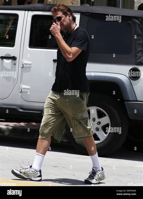 Kevin Hart And Ice Cube Film A Scene For RIde Along In South Beach Alongside Bikini Clad