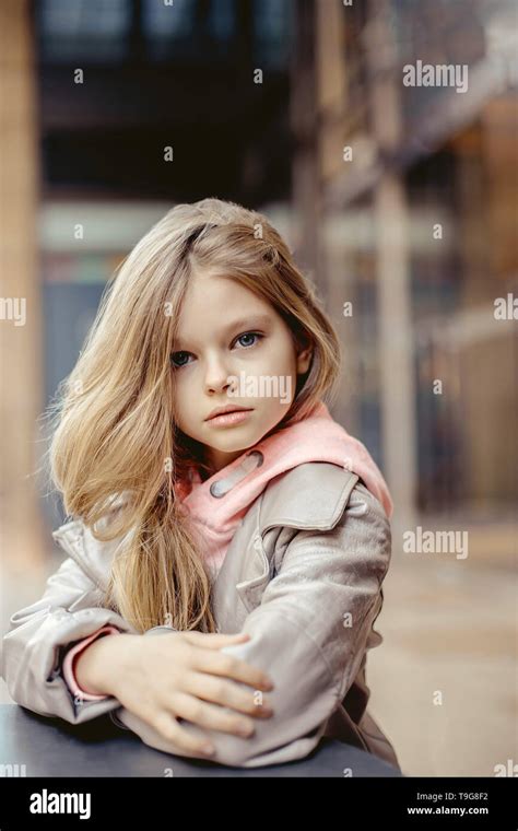 Pretty Girl With Dirty Blonde Hair And Blue Eyes