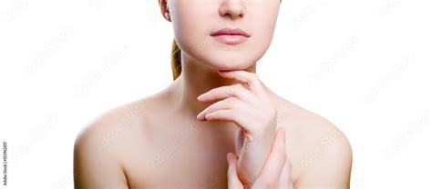 Portrait Of A Girl With Nude Make Up With Hands On Chin Isolated On White Background Girl With