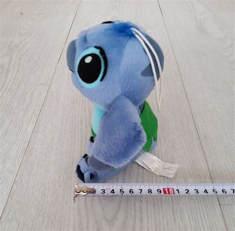 Walt Disney Blue Stitch 15cm Wearing Green Leaves Cartoon Character