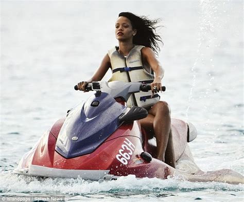 Manny Photos Rihanna Shows Off Her Pert Bum In A White Wet Two Piece Bikini