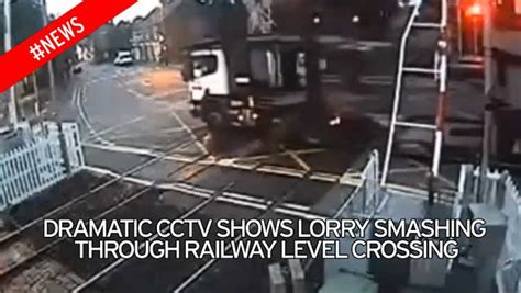 Lorry Driver Smashes Through Level Crossing And Narrowly Misses