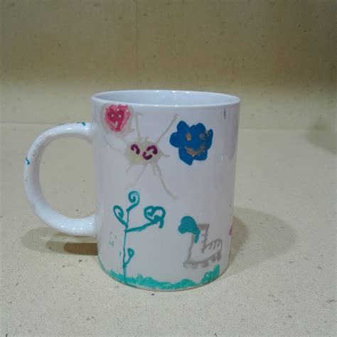 Nuestro Mundo Taza Decorada