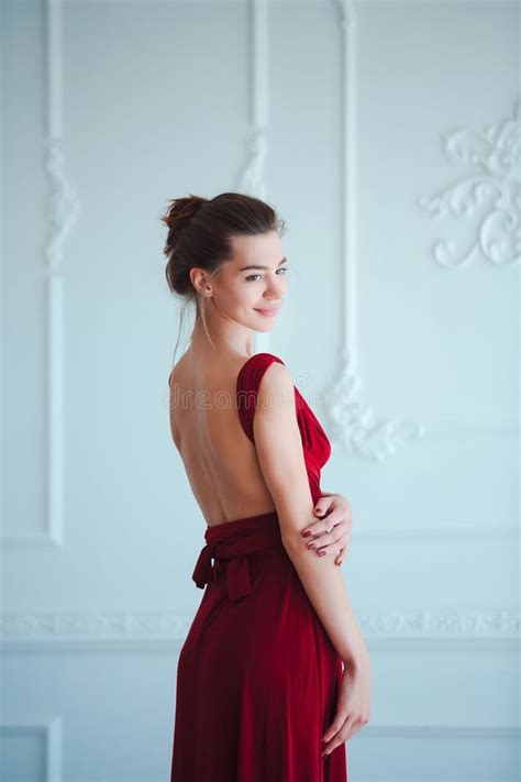 Beauty Brunette Model Woman In Evening Red Dress Beautiful Fashion Luxury Makeup And Hairstyle