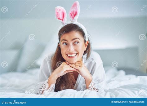 Nice And Brunette On Bed With Bunny Ears Stock Image Image Of