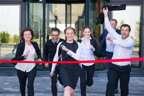 Premium Photo Business People Crossing The Finish Line