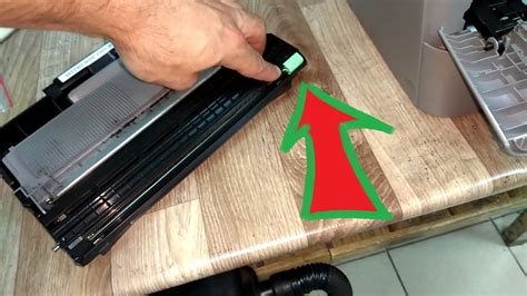 Brother Фотобарабан! Передвиньте зеленый лапку или Подвигайте синий ...