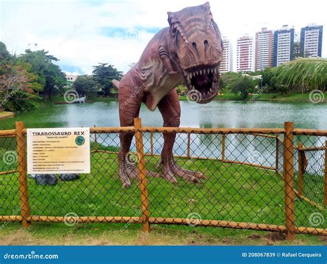 Photo Of The Statue Of A Tyrannosaurus Rex In The Dinosaur Park In