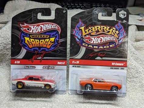 HOT WHEELS WAYNES Garage Vairy Et Larrys Garage Camaro En Orange Avec Rr EUR