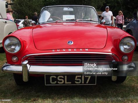 Front View Of A Vintage Red Sunbeam Alpine 1960s British Sports Car At