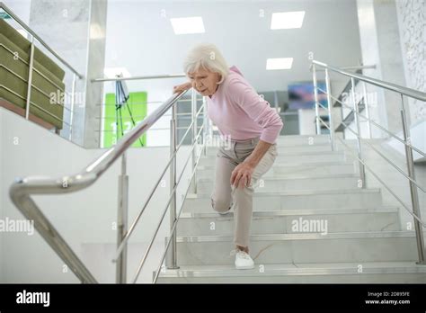 Woman Falling Down Stairs Hi Res Stock Photography And Images Alamy