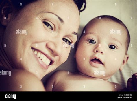 Latina Women Holding Her Happy Baby Hi Res Stock Photography And Images Alamy