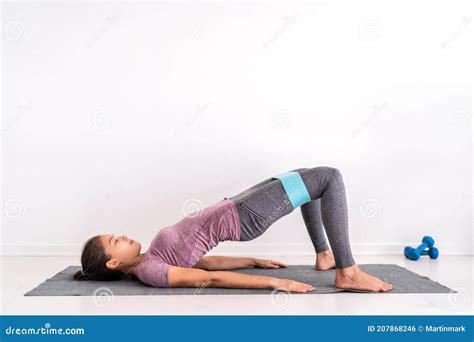 Resistance Hoop Band Exercises Fit Girl Training On Floor Doing Glute