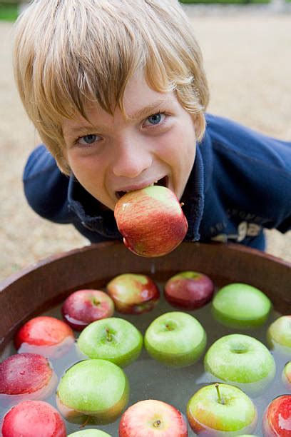 royalty  bobbing  apples pictures images  stock  istock