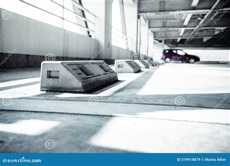Concrete Parking Stopper in a Building Parking Space Stock Image ...