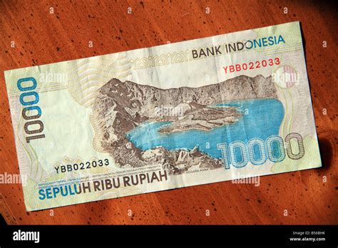 Indonesia 10000 Rupiah Currency Note On Table Stock Photo Alamy