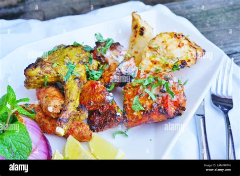 A Tandoori Mixed Grill Platter With Lamb And Chicken At An Indian