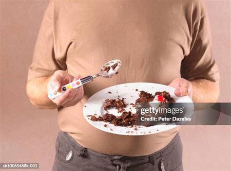 420 Fat Person Eating Cake Stock Photos High Res Pictures And Images