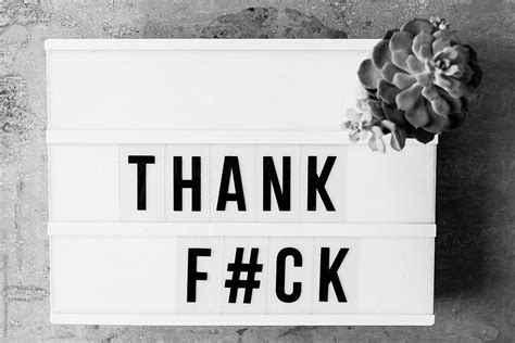 Black And White Image Of The Words Thank Fuck By Stocksy Contributor Helen Rushbrook Stocksy