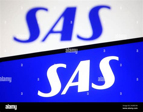 In this photo illustration a Scandinavian Airlines System (SAS) logo is ...