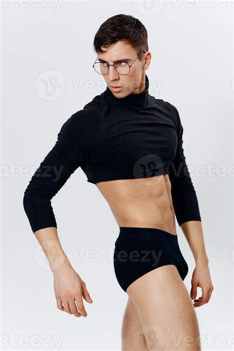 A Handsome Man In A Sweater Panties And A Naked Torso Bodybuilder Muscular Muscles Fitness Sport