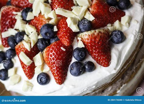 A Detail Of A Home Made Naked Cake With Cream Strawberries Stock Photo Image Of Strawberries