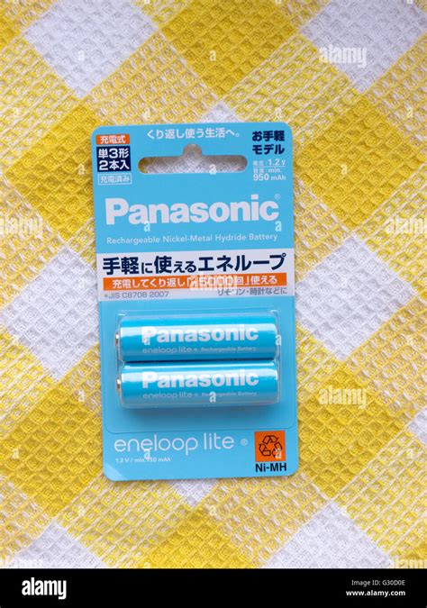 PANASONIC AA Eneloop alkaline battery on a white background. Panasonic ...