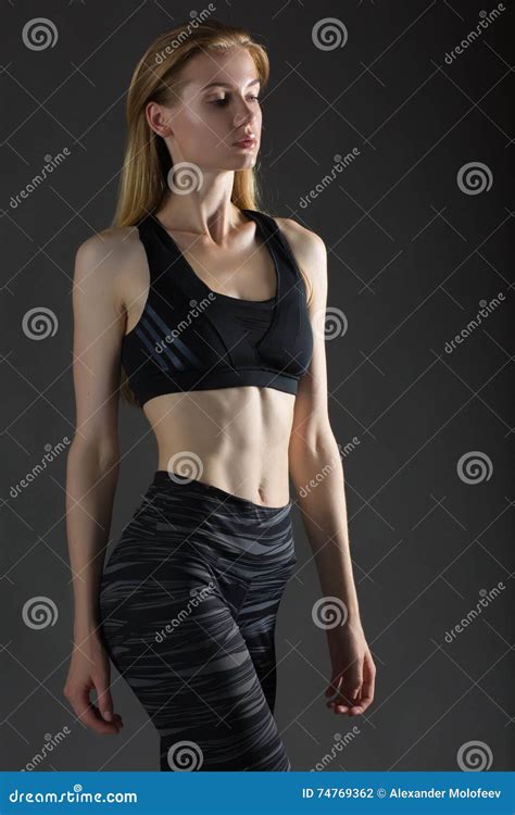 Beautiful Blonde Woman Perfect Athletic Slim Figure Engaged In Yoga Exercise Or Fitness Lead