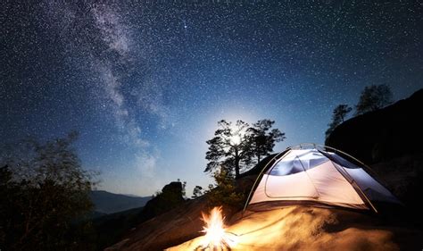 Premium Photo | Night camping in mountain valley under starry sky