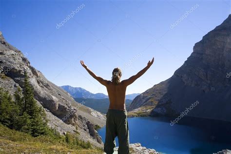 Man Worshipping In Nature — Stock Photo © DesignPicsInc #31709741