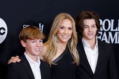 Sheryl Crow's young sons almost tower over her in rare public ...