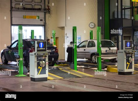 Inspection Of Cars In MOT Testing Centre For A Yearly Motor Vehicle