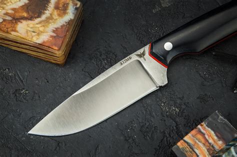 Нож Енот (х12мф, цельнометаллический, микарта)