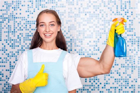 Beautiful Young Female Cleaner Is Doing Clean Up Stock Photo By