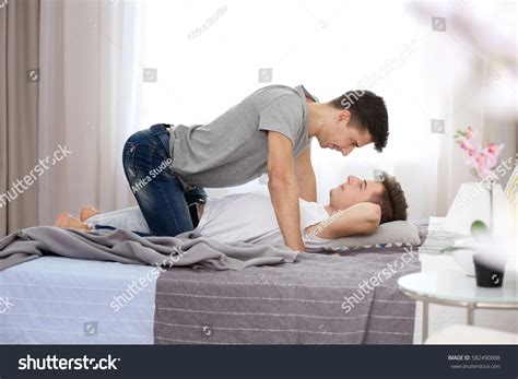 Happy Gay Couple Together On Bed Stock Photo 582490888 Shutterstock