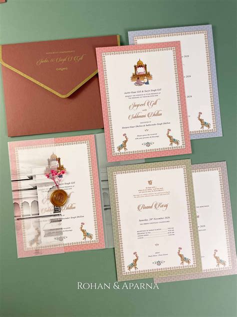 Royal Swagat Pastel Anand Karaj Wedding Card By Rohan Aparna