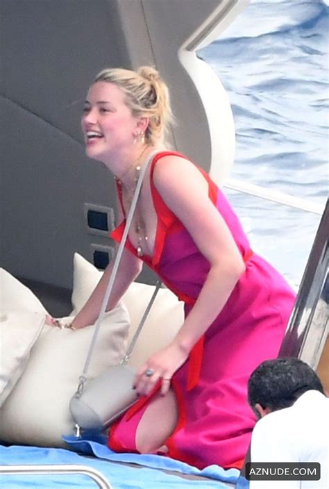 Amber Heard Enjoys A Day In A Red Bikini With Friends Aboard A Yacht On The Amalfi Coast Aznude