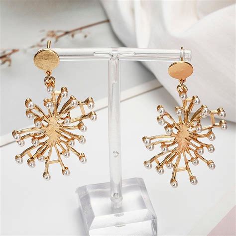 Buy Oomph Gold Tone Pearl Encrusted Floral Motif Drop Earrings Online