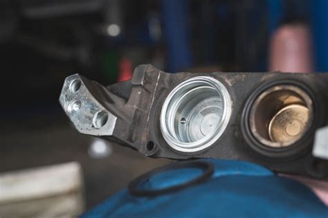Bad Brake Caliper Piston Symptoms In The Garage With