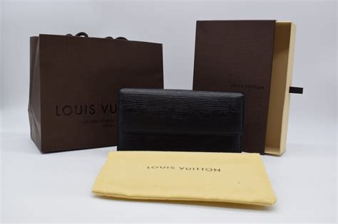 Louis Vuitton - Wallet - Catawiki