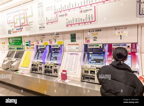 Tokyo Rail Underground Japanese Lady Buys Train Ticket From Vending