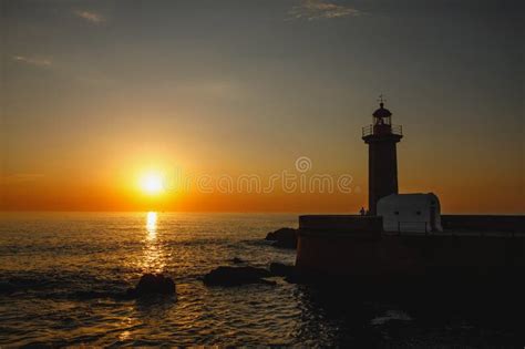 Silhouette Of An Old Lighthouse During The Sunset Stock Image Image