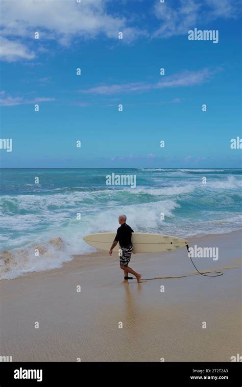 Man Surfing In Hawaii Wave Stock Photo Alamy