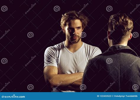 Two Handsome Men Standing With Faces Opposite Stock Image Image Of