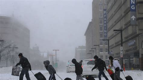 Snowstorm Slams Midwest And Northeast Photos