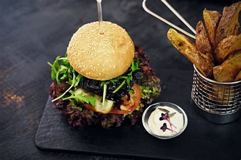 Burger Fries With Salad On A Table Stock Image Image Of Dinner