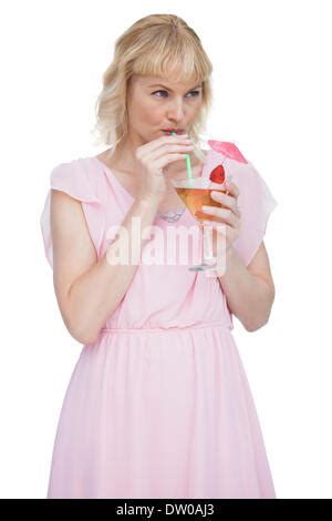 Pretty Blonde Drinking A Cocktail Stock Photo Alamy