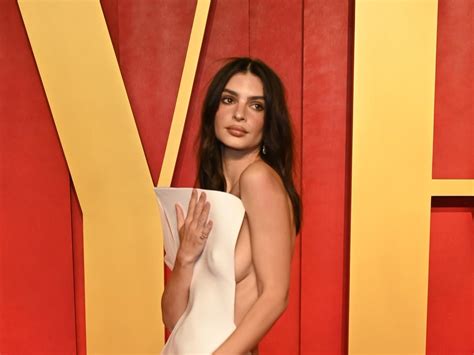 Emily Ratajkowski Shows Side Boob In Revealing White Gown At Oscars Party