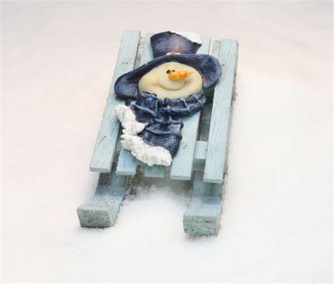 Snowman on sled stock image. Image of cold, happy, sleigh - 35575651